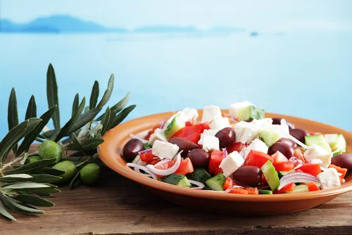 Greek Salad in front of Mediterranean sea